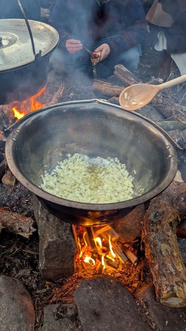 Kochen über offenem Feuer